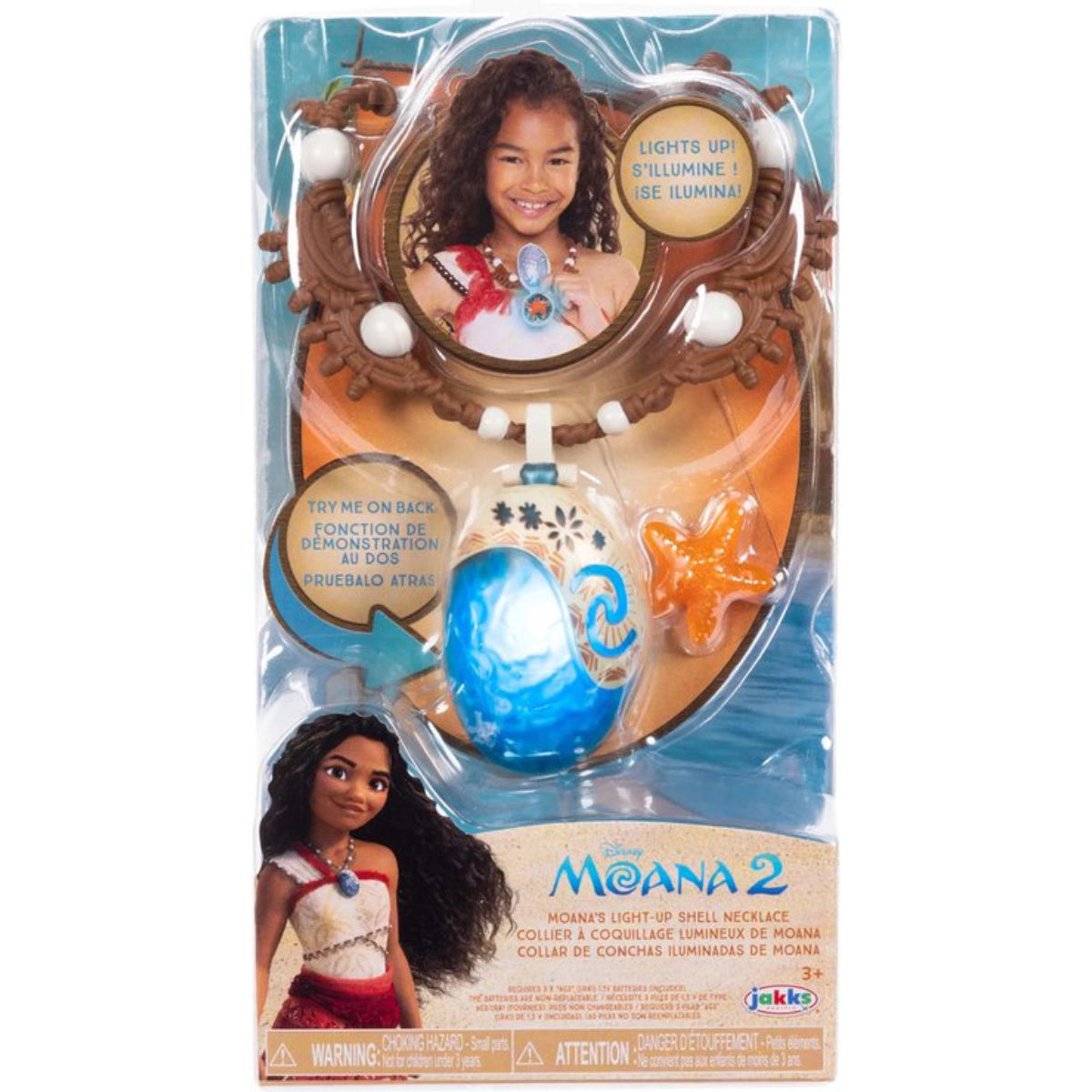Toy packaging featuring a character from Disney's Moana with a light-up shell necklace.