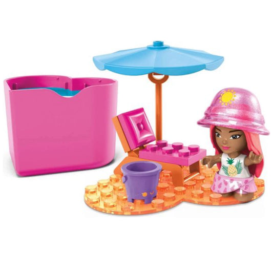 Toy set with a pink sand bucket, blue umbrella, and a figurine on a white background
